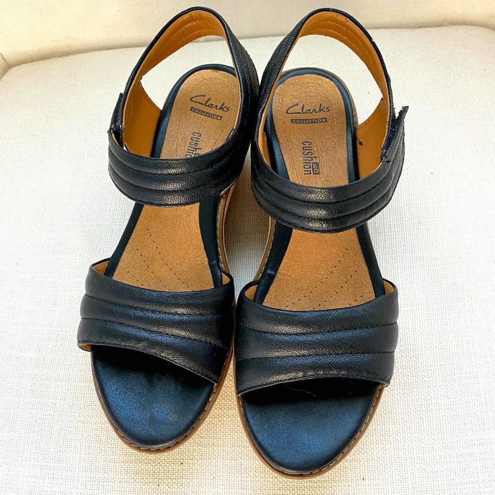 Black leather Clarks cushioned platform sandals